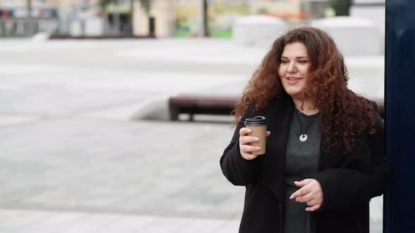 Coffee Break Happy Plus Size Woman Enjoying Walk