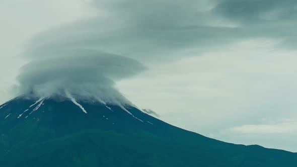 Mountain Peak With Storm Clouds