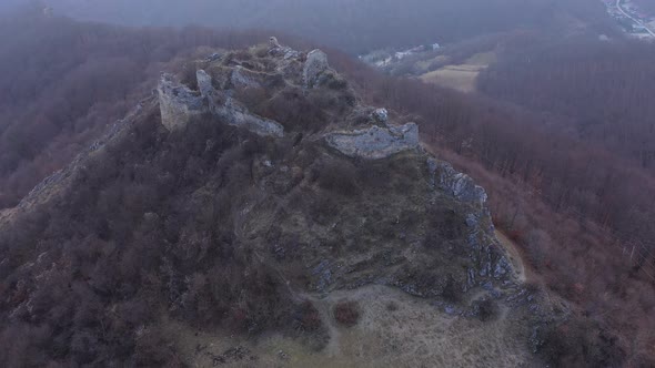 Flying Above Medieval Fortress Ruins, Aerial View of a Stronghold