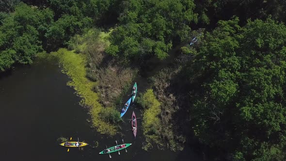 Kayaks Float on the River