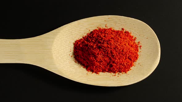 Red Pepper Powder Appear In Wooden Spoon