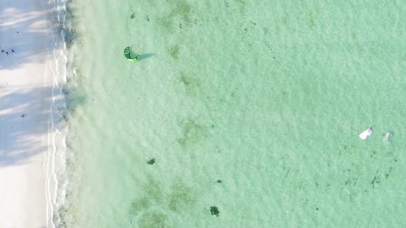 Vertical Video of the Ocean Near the Coast of Zanzibar Tanzania Aerial View