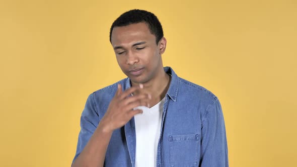 Sad Upset Young African Man Yellow Background