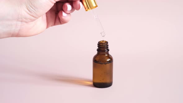 Dropper glass bottle with oil or serum