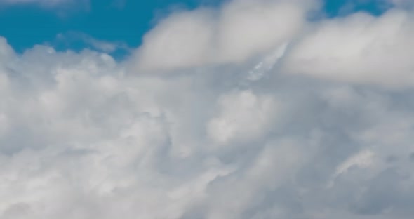Timelapse of the Blue Sky Moving Clouds Background