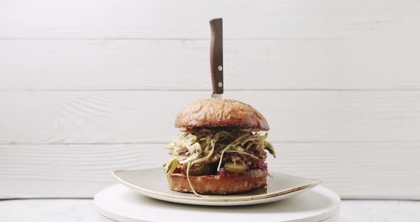 Cool Beautiful Fresh Juicy Cooked Burger Rotate on Turntable on White Background