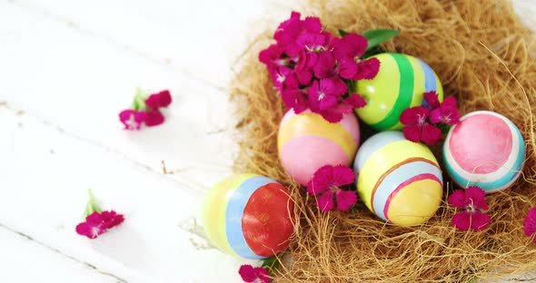 Multicolored Easter eggs in the nest