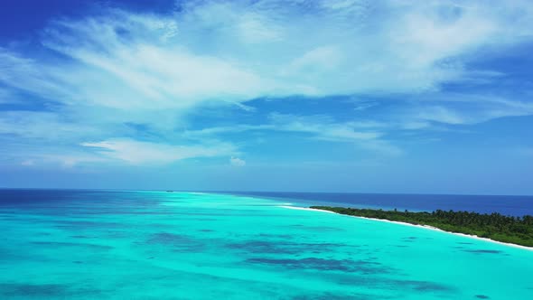 Natural above island view of a white paradise beach and aqua blue water background in best quality 