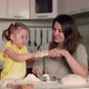 Cheerful Mother and Daughter are Fooling Around While Cooking Pastries From Dough - VideoHive Item for Sale