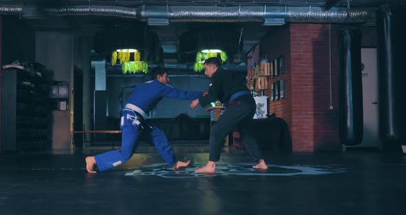 Young Guys are Fighting Jujutsu Techniques