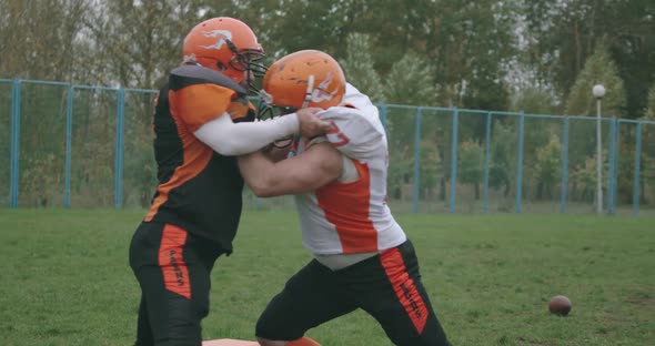 American Football, Battle Between Two Football Players During the Game, Aggressive Fight in the