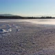 Aerial shot of a frozen mountain lake in the alps - VideoHive Item for Sale
