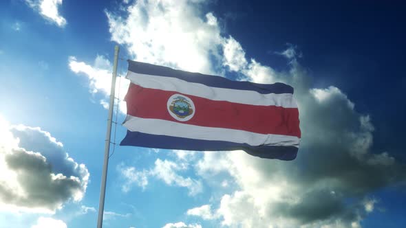 Flag of Costa Rica Waving at Wind Against Beautiful Blue Sky