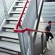 Young woman running up stairs - VideoHive Item for Sale