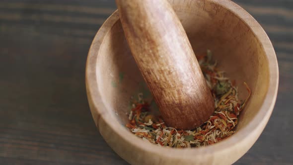 Dried Floral Petals In Mortal With Pestle