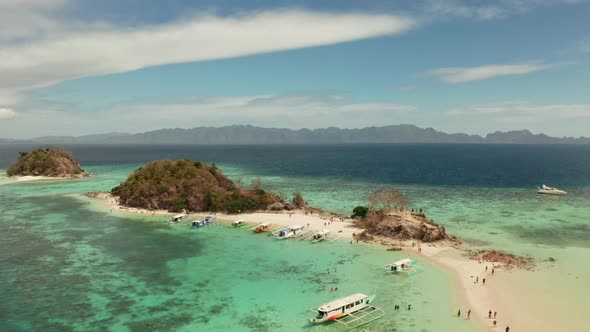 Small Torpic Island with a White Sandy Beach, Top View