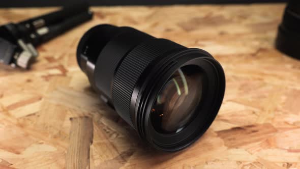Shiny black camera lens -close up