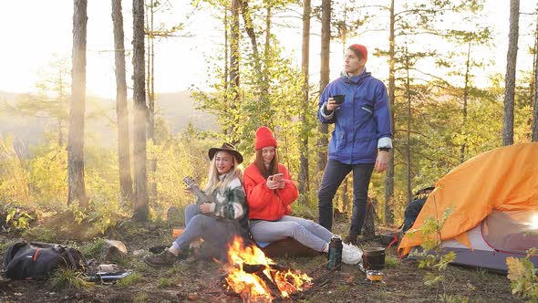 Caucasian Travellers Relax in Forest