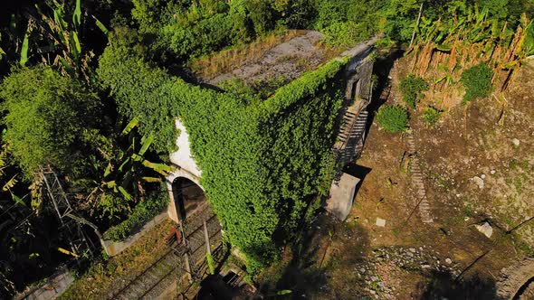 Abandoned Railway Tunnel Overgrown with Green Vegetation in Abkhazia