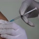 injecting the Covid 19 vaccine into the patient's body - VideoHive Item for Sale