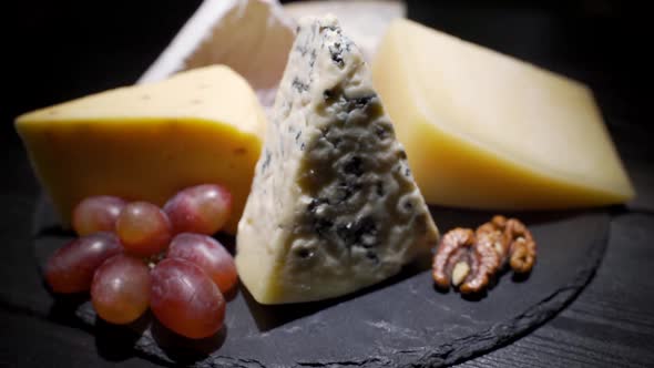 A Variety of Cheeses on a Slate Plate