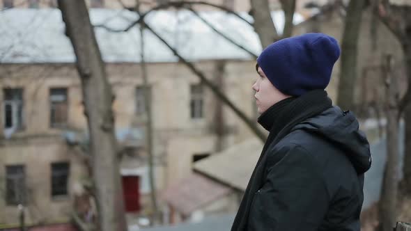 Depressed Male Teenager Having Sad Thoughts, Looking Into Camera, Loneliness