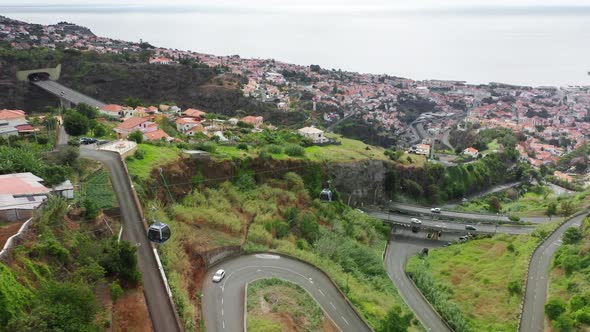 Drone Footage of a Beautiful City Within Steep Slopes