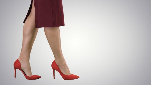 Sexy woman legs in red heels walking Business lady, Alpha Channel