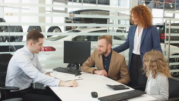 Happy Caucasian Family Sign Document Before Buying.