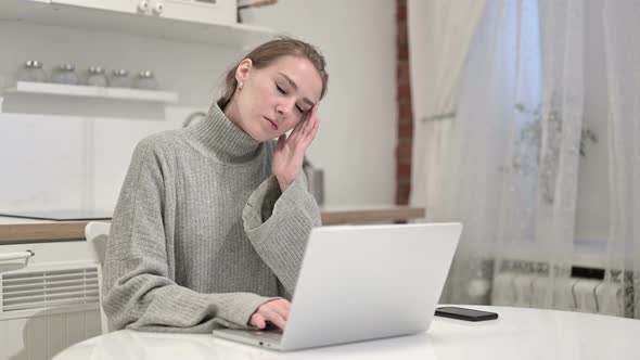 Tired Young Woman Having Headache at Home