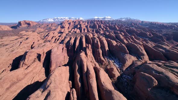 Flying over desert sandstone fins near Moab Utah