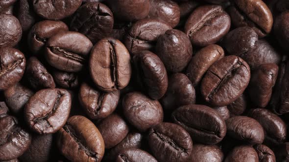 Rotating Shot of Delicious Roasted Coffee Beans alt