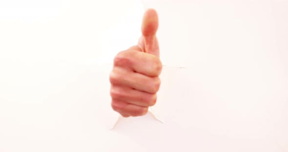 Hand showing thumbs up