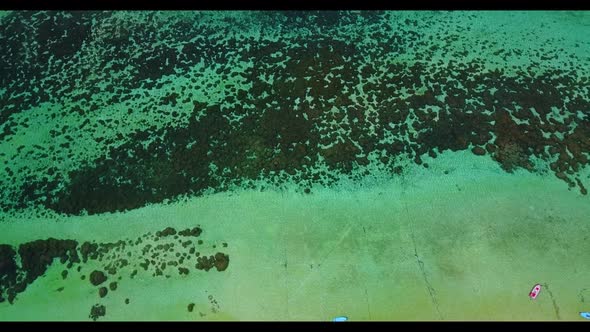 Aerial nature of paradise island beach adventure by shallow water with white sandy background of a d