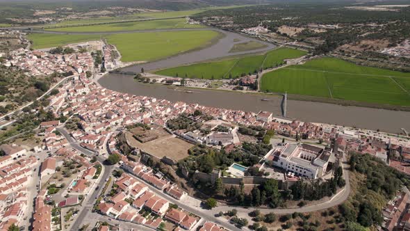 Pousada Castelo Alcácer do Sal surrounded by cityscape and Sado river