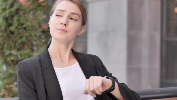 Waiting Young Businesswoman Sitting Outdoor