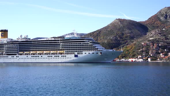 Huge Cruise Ship Sails Past the Coast of Budva