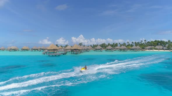 Aerial drone view of jetski personal watercraft in Bora Bora tropical island