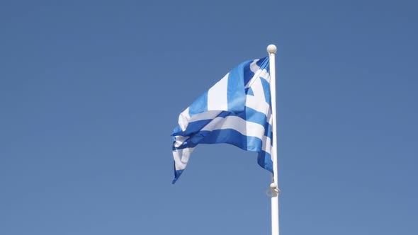 Flag of Greece against blue sky waving slow-mo  1920X1080 HD footage - Slow motion national Greek sy