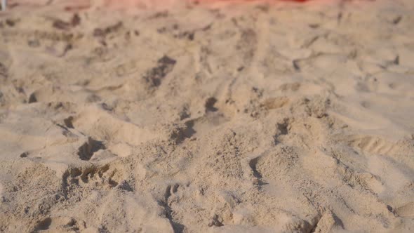 Slowmotion Shot of a Young Woman on a Tropical Beach Sitting on an Inflatable Sofa. Summer Vacation