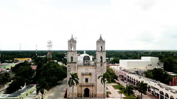 Aerial raising view of a church in Valladolid Mexico