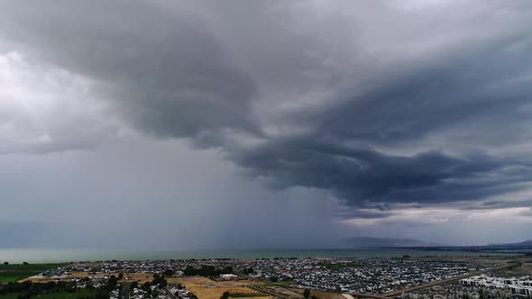 Hyperlapse of dramatic summer rain storm moving over Utah Lake