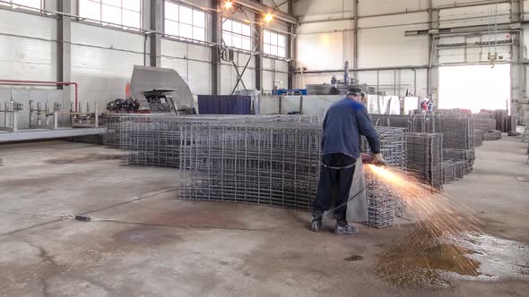 Construction Works with Circular Abrasive Cutoff Saw Angle Grinding Machine and Sparkles Timelapse