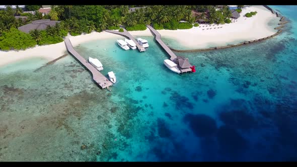 Aerial view nature of marine shore beach vacation by blue water with white sandy background of a day