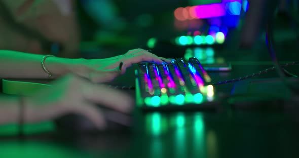 Female Hands Click on the Buttons of the Keyboard