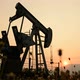 pumpjack at an oil drilling site and sunset - VideoHive Item for Sale