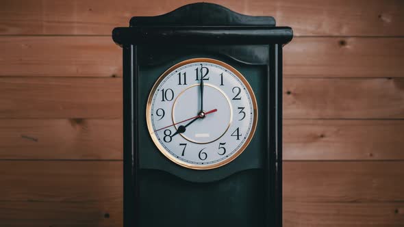 Timelapse of Vintage Clock with Full Turn of Time Hands at 8 AM or PM