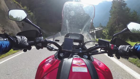 POV Biker Rides on Motorbike By Scenic Green Mountain Road Swiss Alp Moto Trip