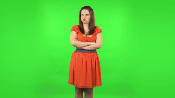 Cute Girl Is Very Offended and Looking Away . Green Screen