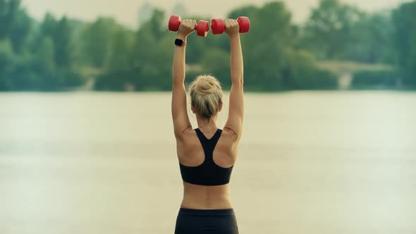 Fitness Dumbbells Exercising. Woman Fitness Workout. Fit Athletic Girl In Sportwear Training.